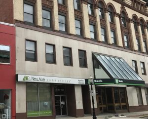 Street view of NewVue Communities storefront at 470 Main Street in downtown Fitchburg, next door to TD Bank